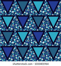 Seamless geometric pattern. Drops texture. The texture of the triangles of dots. Textile rapport.