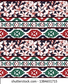 Seamless geometric pattern. Ethnic aztec mexican tropical tribal floral motifs with exotic plumeria flowers background. Grunge ink brush texture. Print for your textiles. Vector illustration.