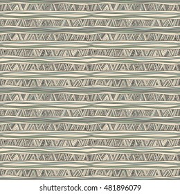 Seamless geometric pattern in ethnic style. Tribal, folk traditional motifs. Triangles, zigzags, stripes. 