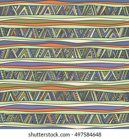 Seamless geometric pattern in ethnic style. Tribal, folk traditional motifs. Triangles, zigzags, stripes. Painted hands. Cheerful motley color.
