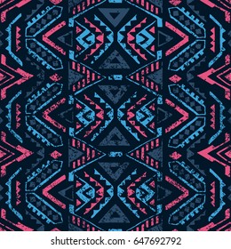 Seamless geometric pattern. Ethnic and tribal motifs. Grunge texture. Print for your textiles. Pink and blue colors. Vector illustration.