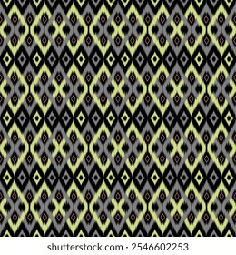 A seamless geometric pattern featuring diamond shapes in green and yellow with a textured ikat style on a black background. The design creates a sense of depth and movement.