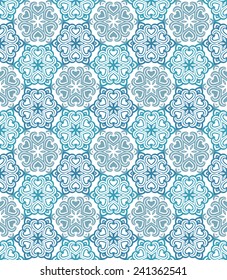 Seamless geometric pattern. Floral blue and white background. Vintage round geometric elements.