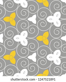 Seamless geometric pattern with flowers. Vector art.