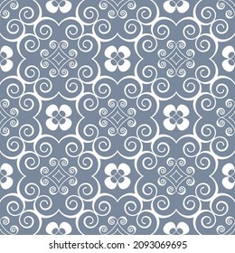 Seamless geometric pattern with flowers. Vector art.