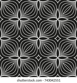 Seamless geometric pattern with flowers. Vector art.
