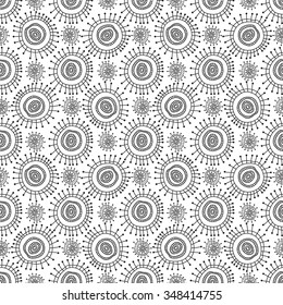 Seamless geometric pattern. Funky colorful circles abstract shapes drawn by hand, black and white graphics. For the design and decoration background, wallpaper, packaging, fabrics, textiles.