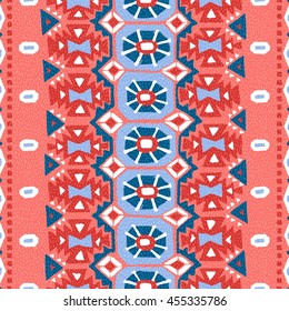 Seamless geometric pattern. Handmade carpet. Vintage ornament. The geometric elements. Ethnic and tribal motifs. Blue, white, pink and red colors. Vector illustration.