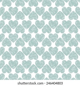 Seamless geometric pattern with hearts. Vector holiday texture with speckled effect. Pastel delicate pattern for St. Valentine's Day