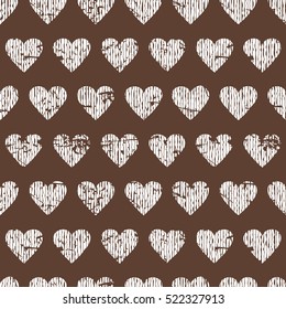 Seamless geometric pattern with hearts. Vector repeating texture. Dark brown and white