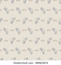 Seamless geometric pattern with incline big and small bicycle on beige background
