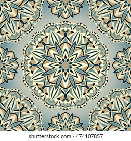 Seamless geometric pattern of mandalas on a blue background. Vector oriental ornament. Design for any surface. Stylized template for carpet.