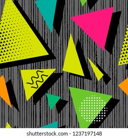 Seamless geometric pattern in memphis style. Pop art triangles. fashion style pattern illustration background. Ideal for fabric design, paper print and website backdrop.