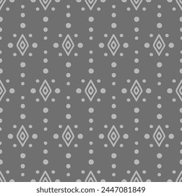 Seamless geometric pattern with monochrome diamond shapes and dots. Ethnic abstract repeating background.