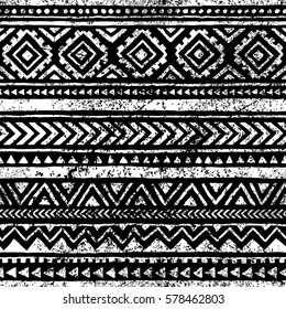 Seamless geometric pattern. Print for your textile. Ethnic and tribal motifs. Black and white ornament. Grungy texture. Vector illustrations.