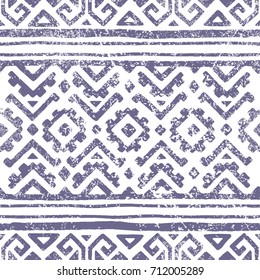 Seamless geometric pattern. Print for your textile. Ethnic and tribal motifs. Gray and white ornament. Grungy texture. Vector illustrations.