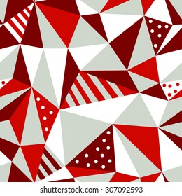 Seamless geometric pattern of red, white  and gray triangles.