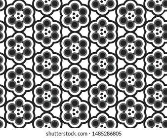 Seamless geometric pattern. Shaped flowers, circles, arrows in black, white and grey colors.