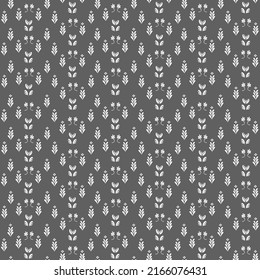 seamless geometric pattern with silhouettes of plants on a dark background