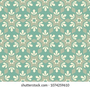 seamless geometric pattern with stars and flowers against a green background