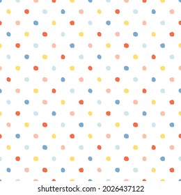 Seamless geometric pattern in the style of confetti with colored circles in the style of polka dot. White background.