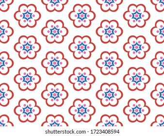 Seamless geometric pattern, texture or background vector in red, blue and pink colors on white background.