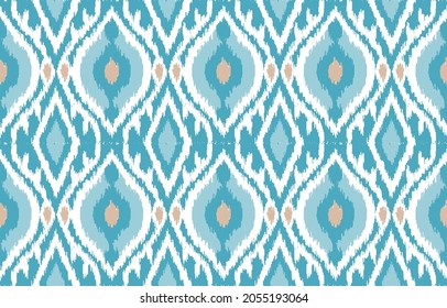 seamless geometric pattern. Tribal Art Ikat Ogee in traditional classic blue colors. based on ikat fabric style. Vector illustration.