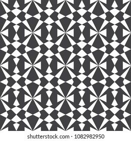 Seamless geometric pattern. Vector graphic. Black and white wallpaper. Simple and modern shape design. Op abstract art. Decorative print.