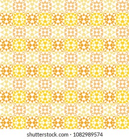 Seamless geometric pattern. Vector graphic. Yellow and orange wallpaper. Simple and modern shape design. Op Abstract art. Decorative print. Polygonal background.