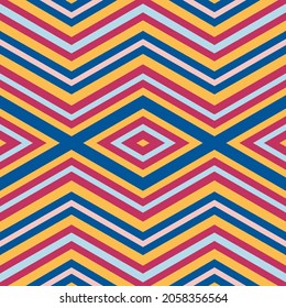 Seamless geometric pattern of  vibrant colorful rhombuses and zig zag lines. Vector illustration for web, card, scrapbooking. Spring and summer colors, yellow, pink, blue, pastel shades. EPS 10.