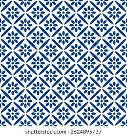 Seamless geometric tile pattern with blue floral ornaments on white background. Elegant traditional ceramic style.