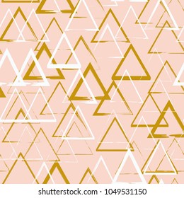 Seamless geometric tribal triangle hand drawn pastel background pattern in vector gold pink. Modern  design for paper, cover, fabric, interior decor and other users. Vector illustration.