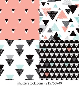 Seamless geometric tribal triangle hand drawn pastel background pattern in vector