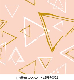 Seamless geometric tribal triangle hand drawn pastel background pattern in vector
gold pink