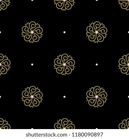 Seamless geometrical abstract pattern with golden spiral mandalas and pearl beads. On black background.