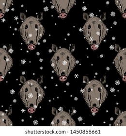 Seamless geometrical animal pattern with hand drawn heads of wild boar or wild pig and snowflakes.