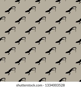 Seamless geometrical animal pattern with silhouettes of lizards.