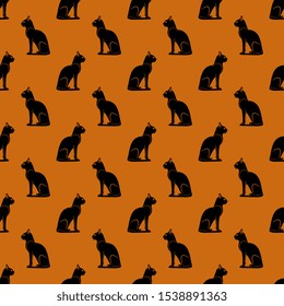 
Seamless geometrical animal pattern with small silhouettes of sitting cats. Halloween motif.