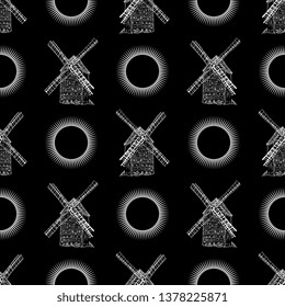 Seamless geometrical black and white pattern with hand drawn silhouettes of vintage wind mill and abstract round solar shapes.
