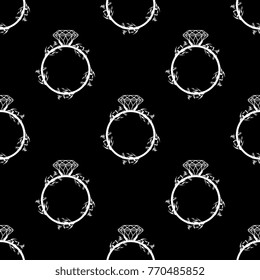 Seamless geometrical black and white pattern with wedding emblems. Engagement ring intertwined with wreath of forget-me-nots.