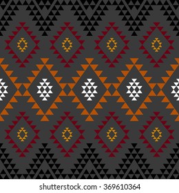 Seamless geometrical ethnic pattern. Mexican aztec motives. Grey background.