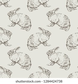 Seamless geometrical monochrome animal pattern with hand drawn silhouettes of rabbits or hares. Vintage engraving style.