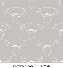 Seamless geometrical monochrome animal pattern with silhouetted heads of hammer fish or hammerhead shark. Hand drawn doodle sketch.
