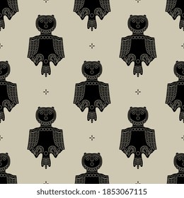 Seamless geometrical monochrome animal pattern with stylized owls. Permian animal style. Tribal totem art from ancient Siberia.