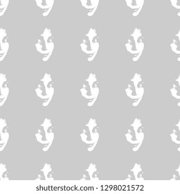 Seamless geometrical monochrome pattern with silhouetted female faces.