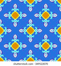 Seamless geometrical pattern in blue, green and orange colors. Vector illustration.