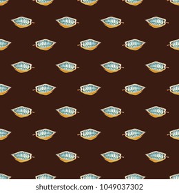 Seamless geometrical pattern with cocoa bean pods. Cartoon style.