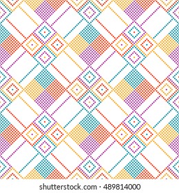 Seamless geometrical pattern of colored dots. Vector illustration.