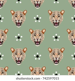 Seamless geometrical pattern with leopard faces and simple polka dot floral motifs. Flat cartoon style.
