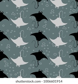 Seamless geometrical pattern with manta stingray fish and water bubbles.
